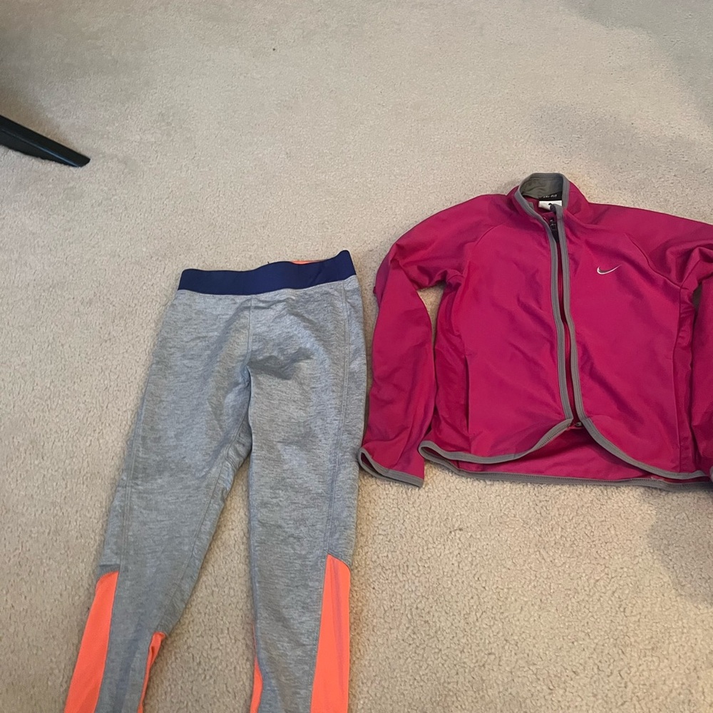 Nike Kids Pink Jacket and Gray Leggings with Orange Accents